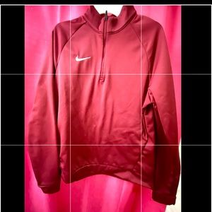 Nike tech sweatshirt.